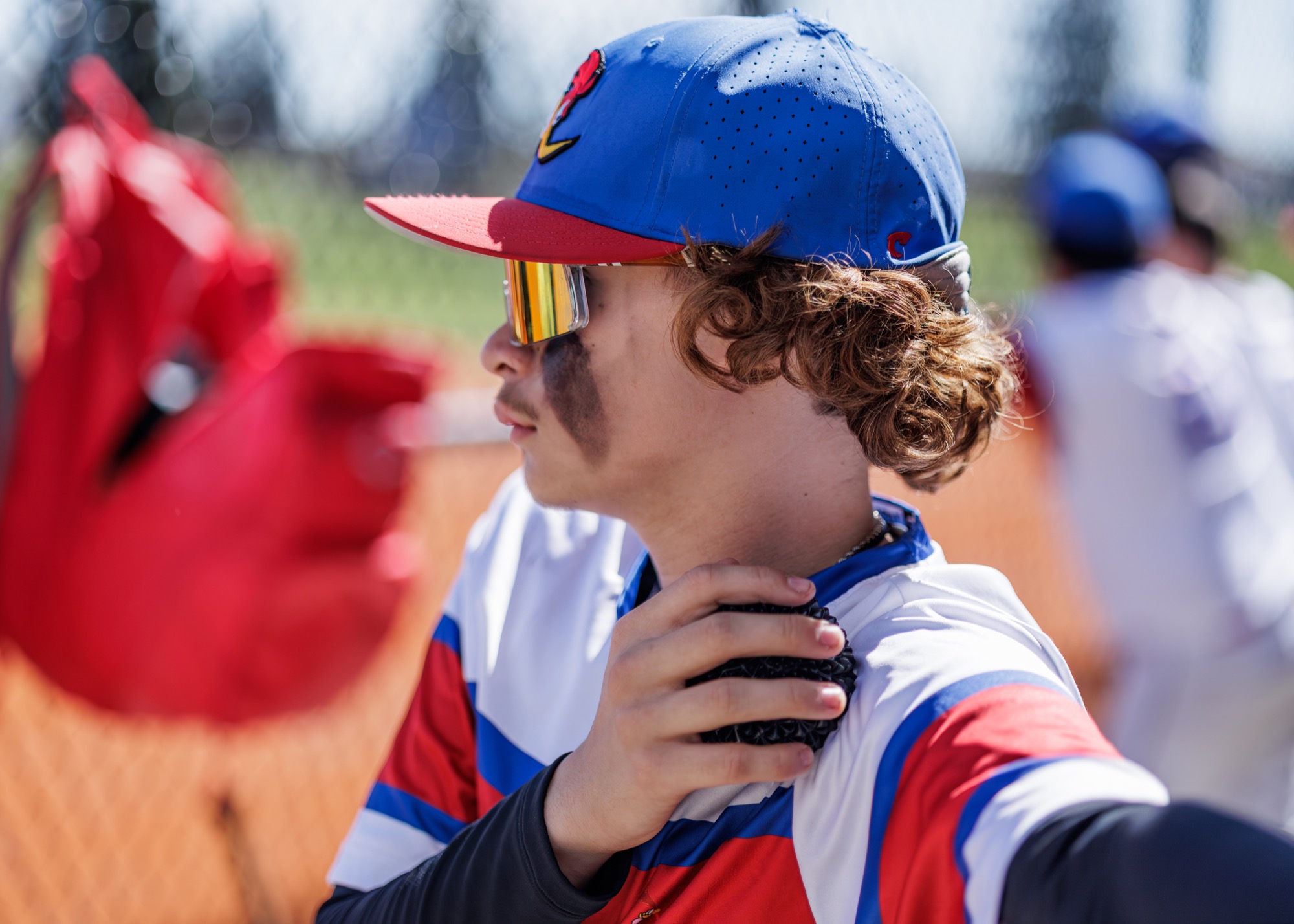 Road Runners player staying focused in the dugout